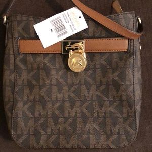 Michael kors cross body bag. Never worn
